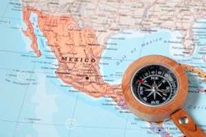 travel-destination-mexico-map-compass-pointing-planning
